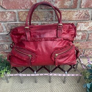 Vintage red scarlet Gucci leather bag.
